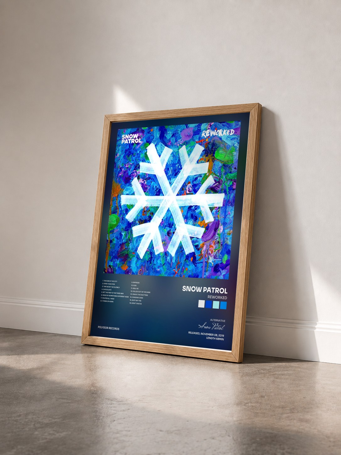 #bois Tableau de l'album Reworked de Snow Patrol vu de trois quarts, cadre en bois brut