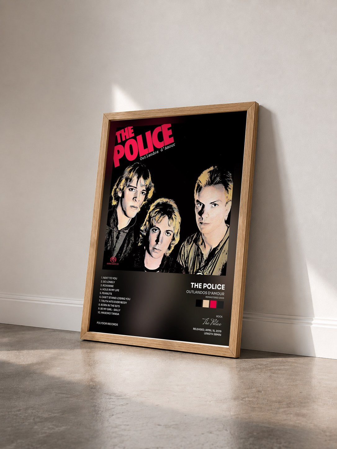 #bois Tableau de l'album Outlandos D'Amour (Remastered 2003) de The Police vu de trois quarts, cadre en bois brut