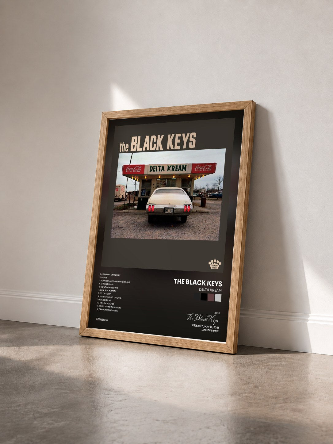 #bois Tableau de l'album Delta Kream de The Black Keys vu de trois quarts, cadre en bois brut