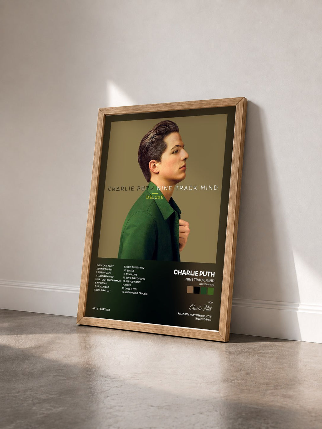 #bois Tableau de l'album Nine Track Mind (Deluxe Edition) de Charlie Puth vu de trois quarts, cadre en bois brut