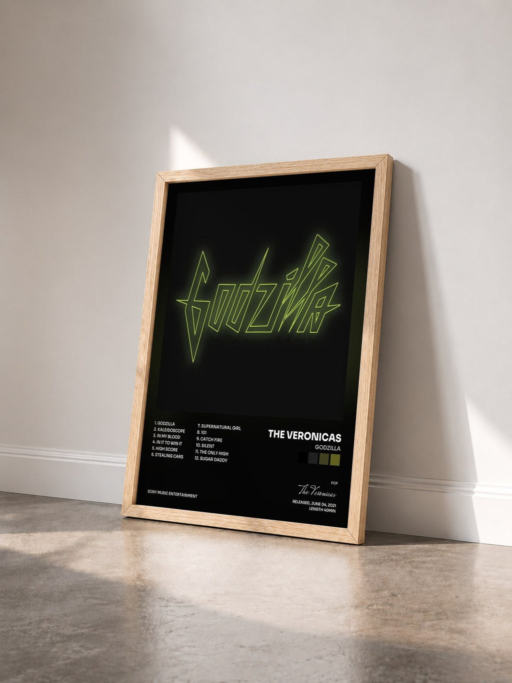 #bois Tableau de l'album GODZILLA de The Veronicas vu de trois quarts, cadre en bois brut