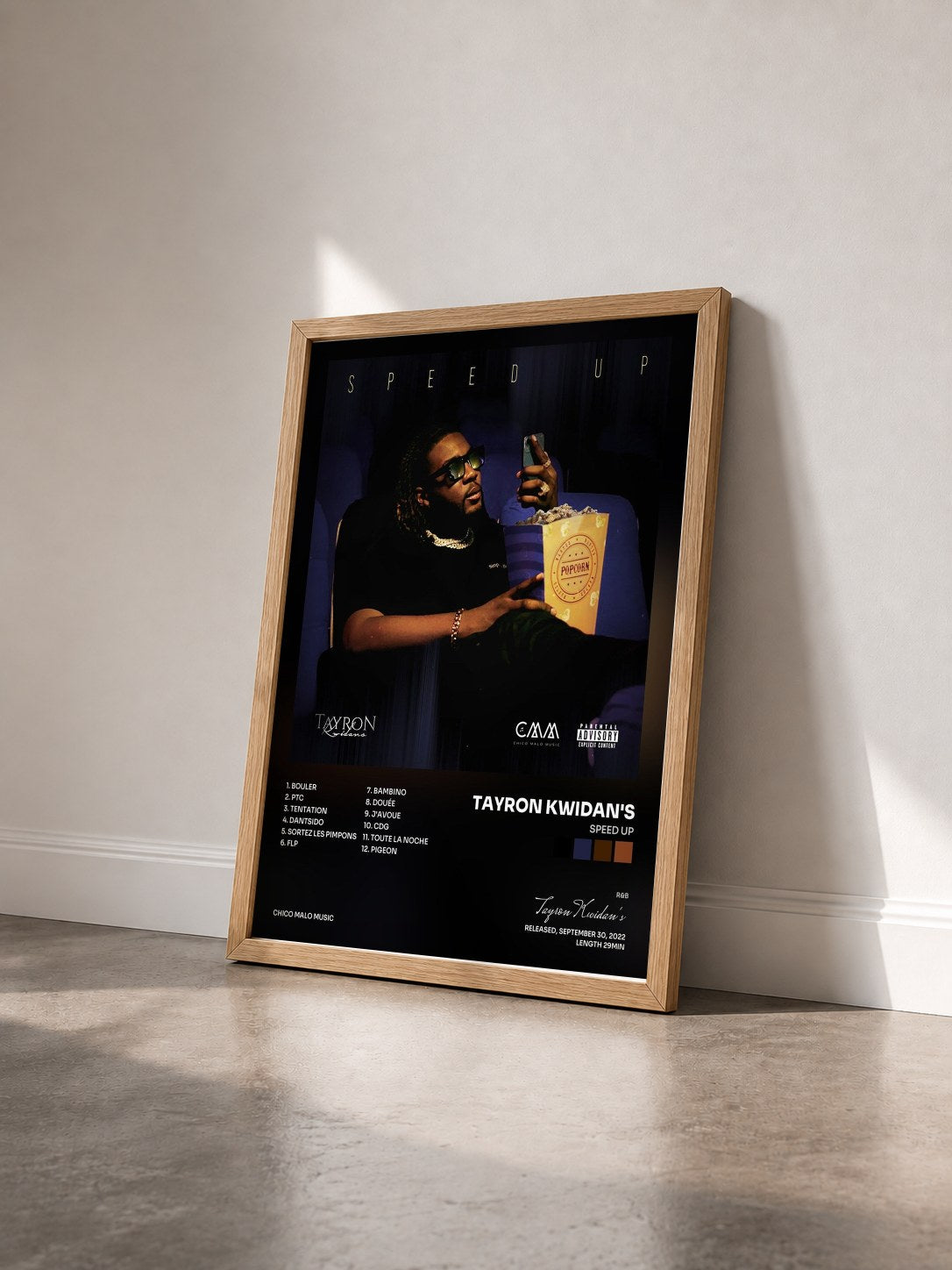 #bois Tableau de l'album Speed Up de Tayron Kwidan's vu de trois quarts, cadre en bois brut