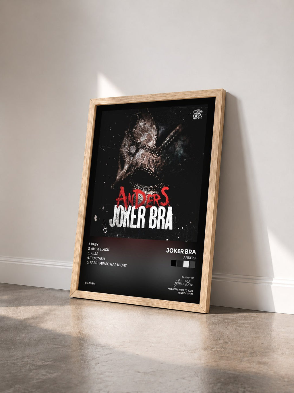 #bois Tableau de l'album ANDERS de Joker Bra vu de trois quarts, cadre en bois brut