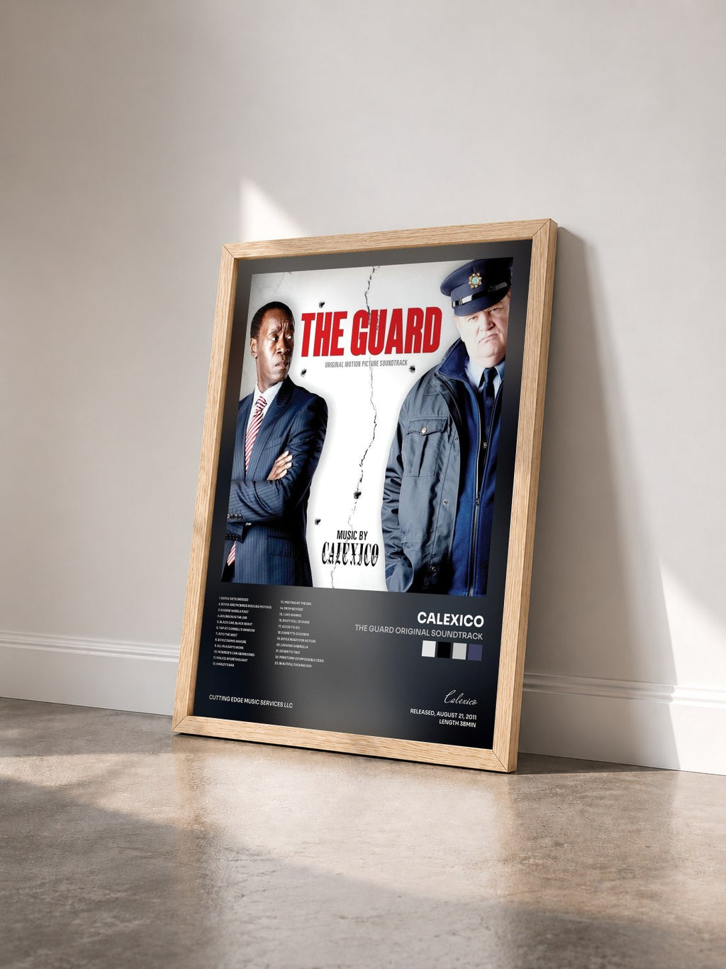#bois Tableau de l'album The Guard Original Soundtrack de Calexico vu de trois quarts, cadre en bois brut