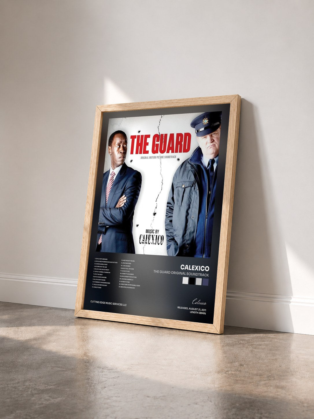 #bois Tableau de l'album The Guard Original Soundtrack de Calexico vu de trois quarts, cadre en bois brut