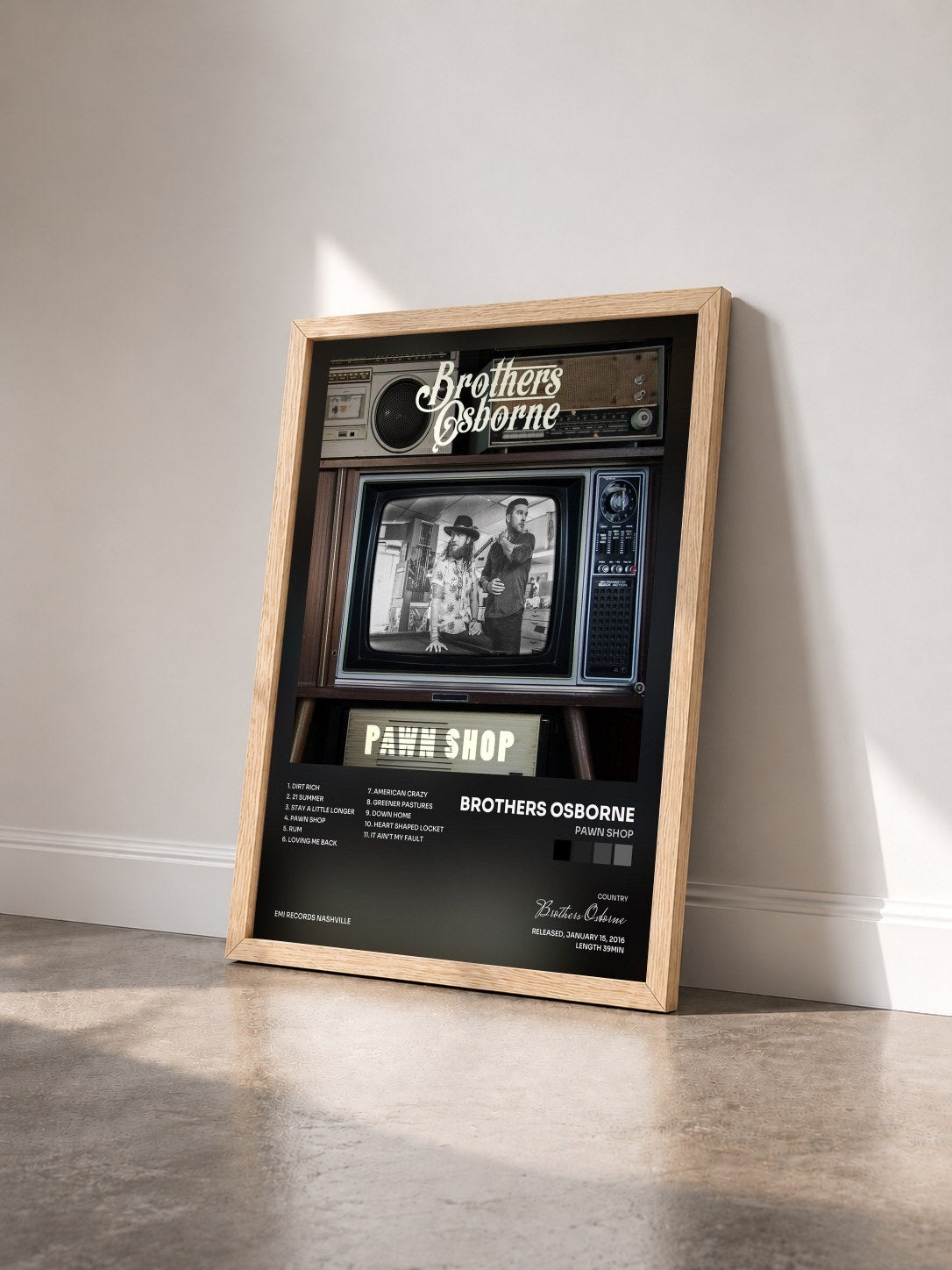 #bois Tableau de l'album Pawn Shop de Brothers Osborne vu de trois quarts, cadre en bois brut