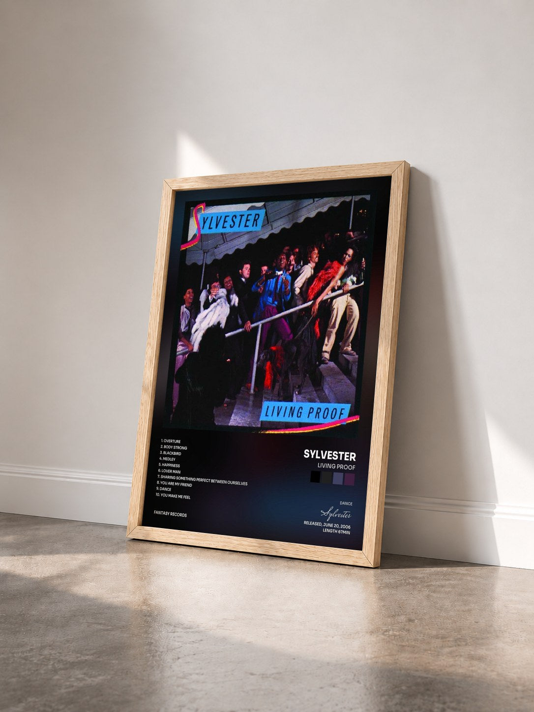 #bois Tableau de l'album Living Proof de Sylvester vu de trois quarts, cadre en bois brut