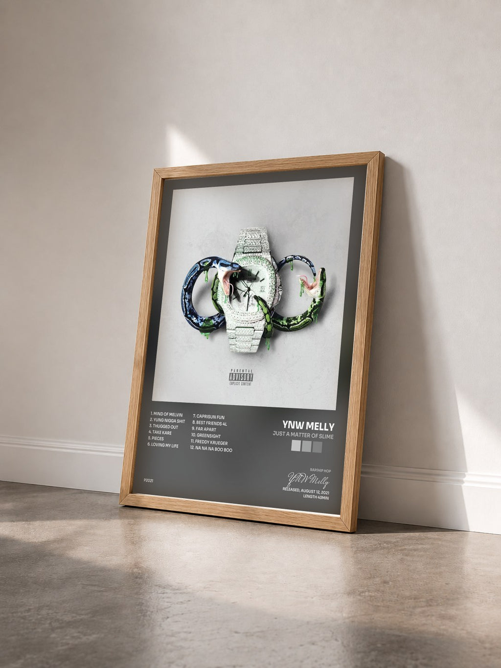 #bois Tableau de l'album Just A Matter of Slime de YNW Melly vu de trois quarts, cadre en bois brut