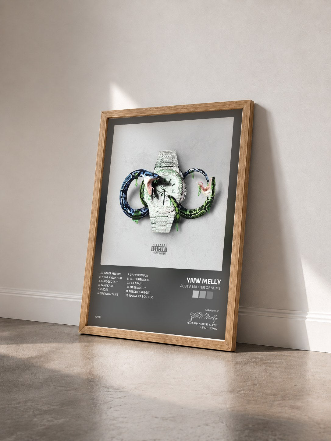 #bois Tableau de l'album Just A Matter of Slime de YNW Melly vu de trois quarts, cadre en bois brut
