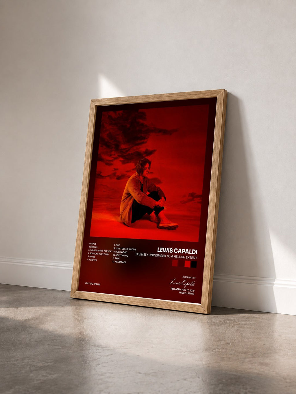 #bois Tableau de l'album Divinely Uninspired To A Hellish Extent de Lewis Capaldi vu de trois quarts, cadre en bois brut