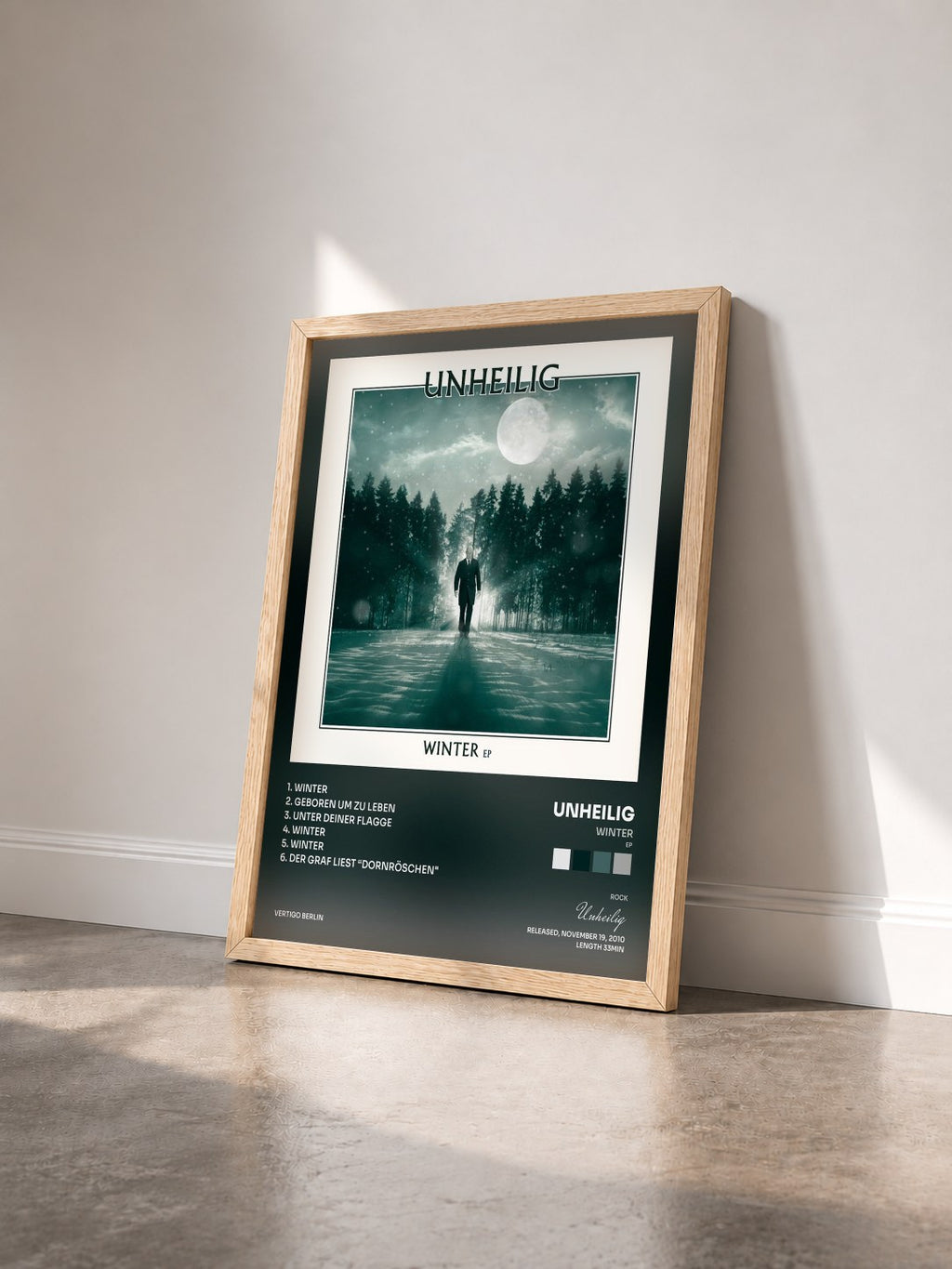 #bois Tableau de l'album Winter (EP) de Unheilig vu de trois quarts, cadre en bois brut