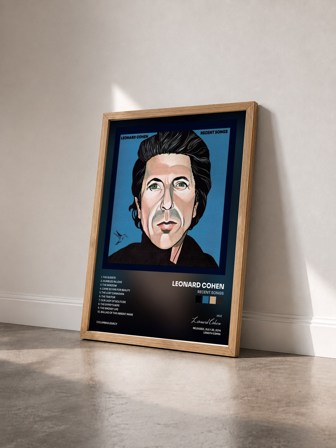 #bois Tableau de l'album Recent Songs de Leonard Cohen vu de trois quarts, cadre en bois brut