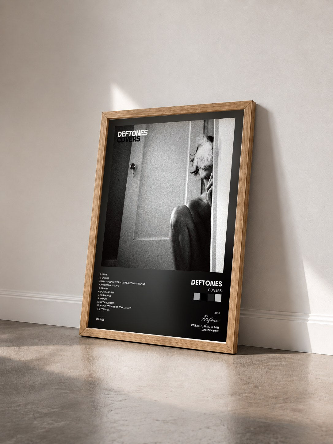 #bois Tableau de l'album Covers de Deftones vu de trois quarts, cadre en bois brut