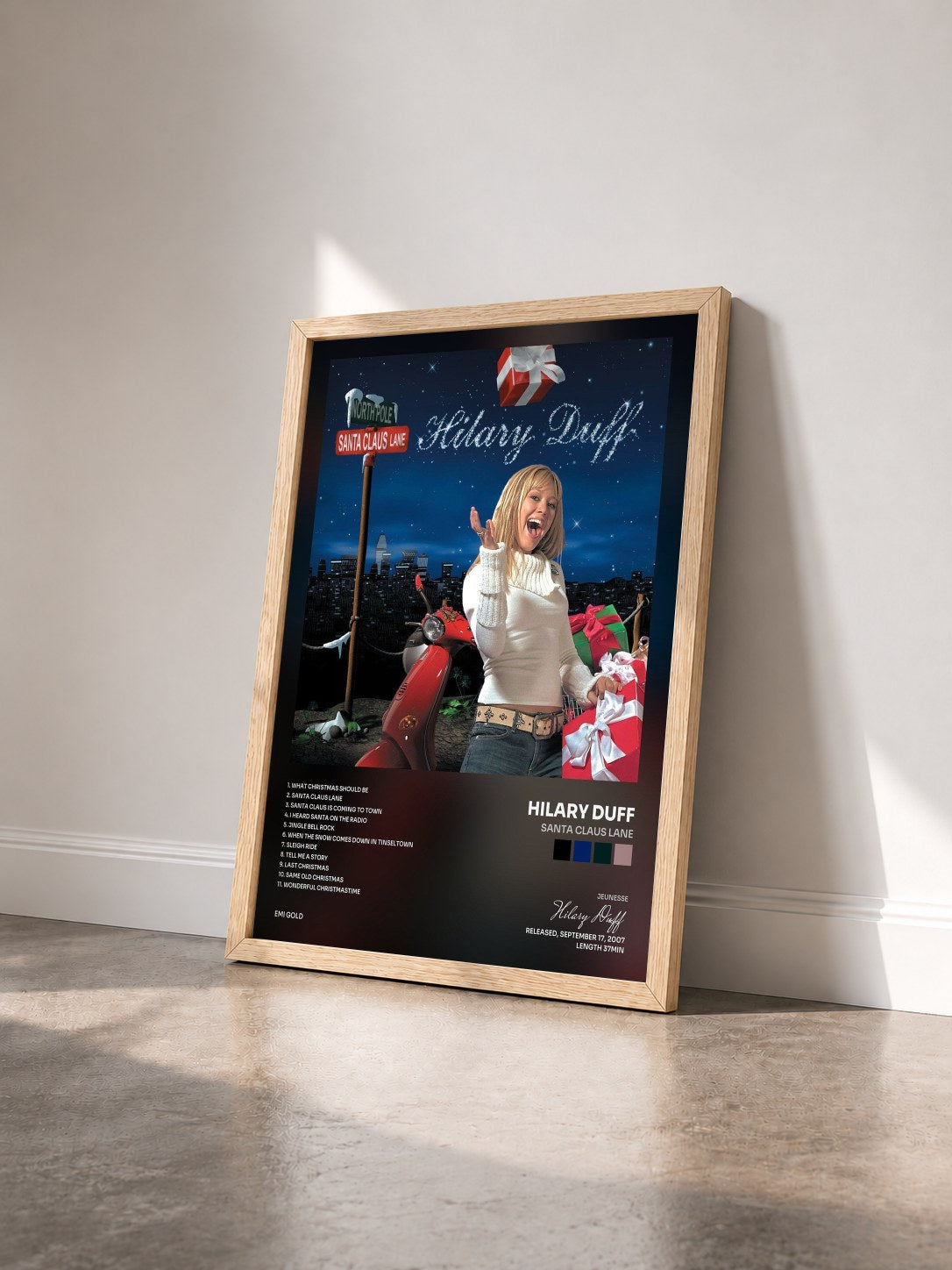 #bois Tableau de l'album Santa Claus Lane de Hilary Duff vu de trois quarts, cadre en bois brut