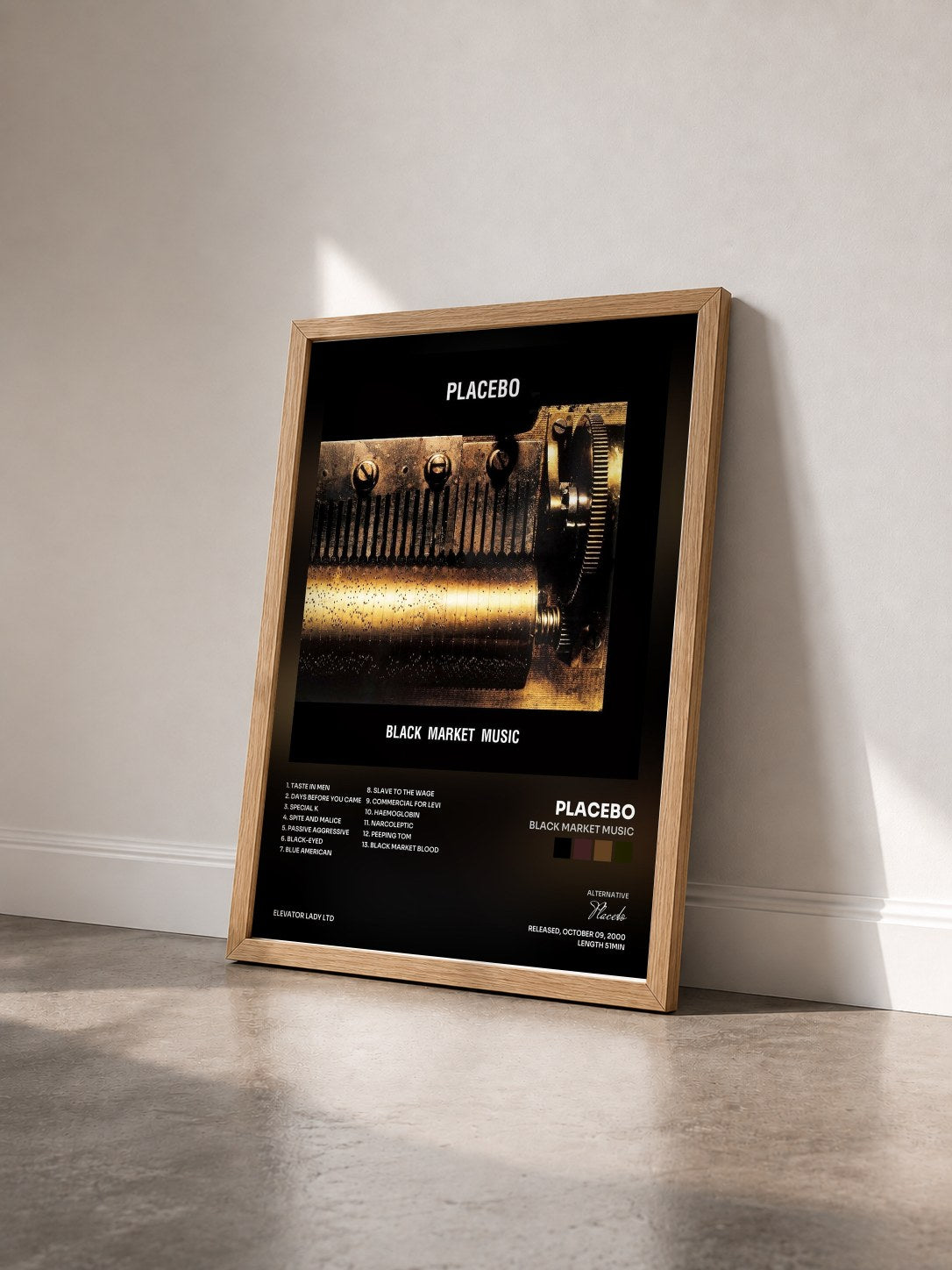 #bois Tableau de l'album Black Market Music de Placebo vu de trois quarts, cadre en bois brut