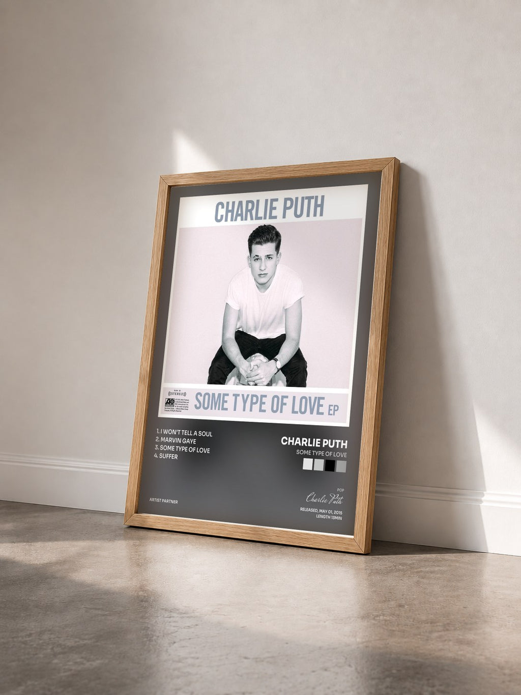 #bois Tableau de l'album Some Type of Love de Charlie Puth vu de trois quarts, cadre en bois brut
