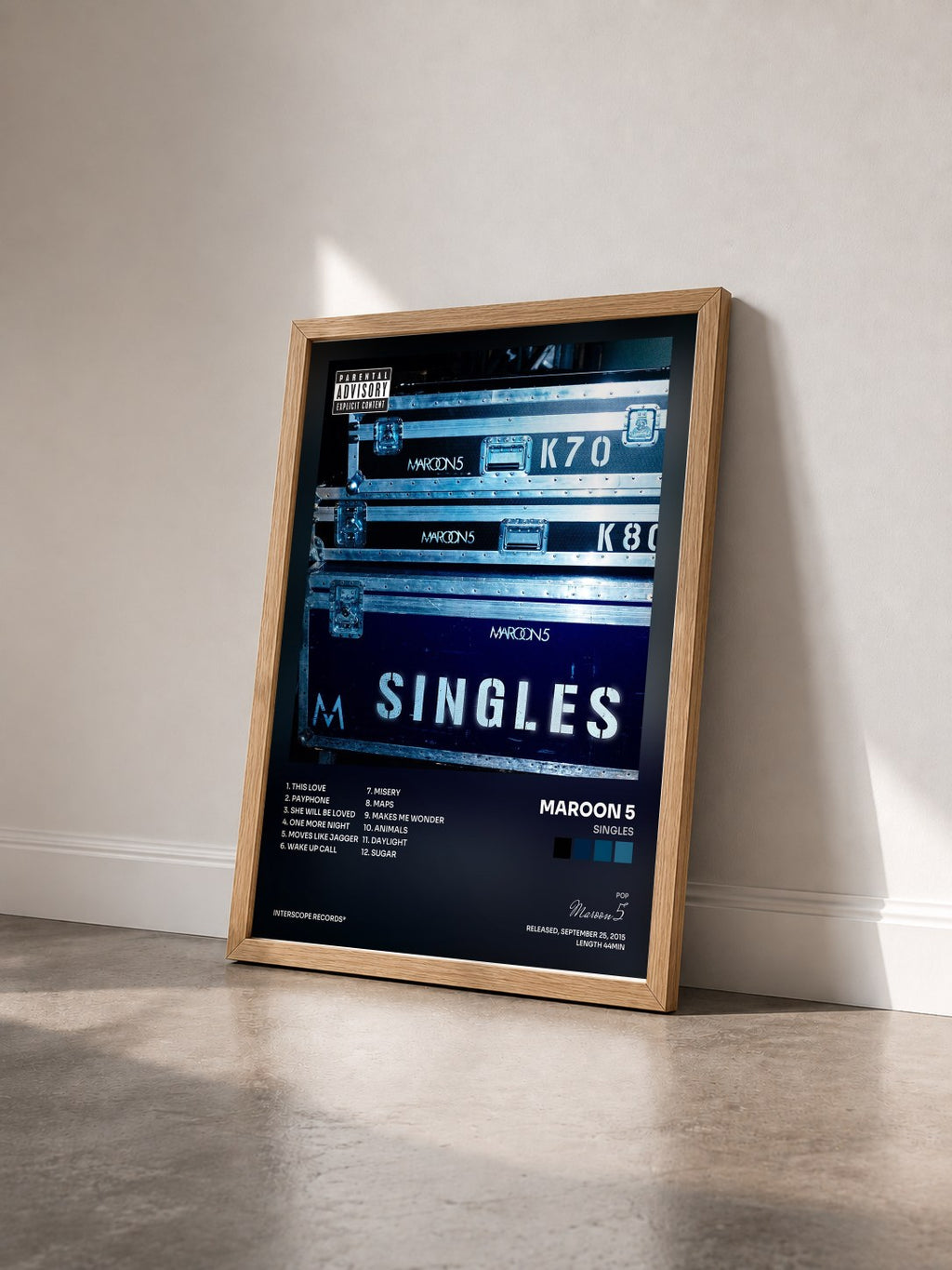 #bois Tableau de l'album Singles de Maroon 5 vu de trois quarts, cadre en bois brut