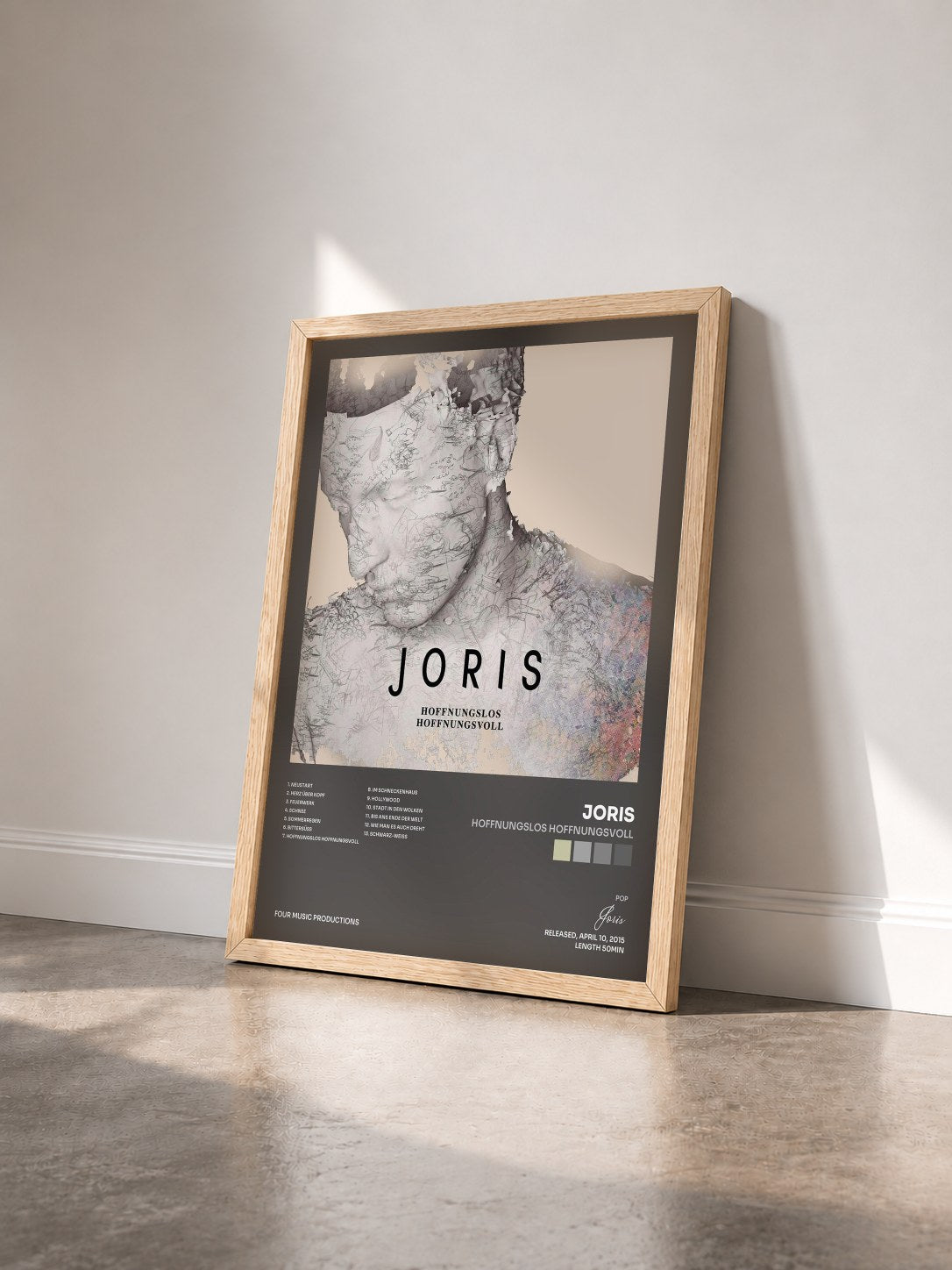 #bois Tableau de l'album Hoffnungslos Hoffnungsvoll de Joris vu de trois quarts, cadre en bois brut