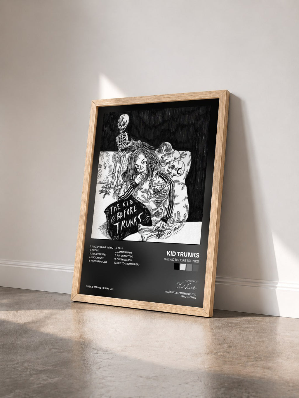 #bois Tableau de l'album The Kid Before Trunks de Kid Trunks vu de trois quarts, cadre en bois brut