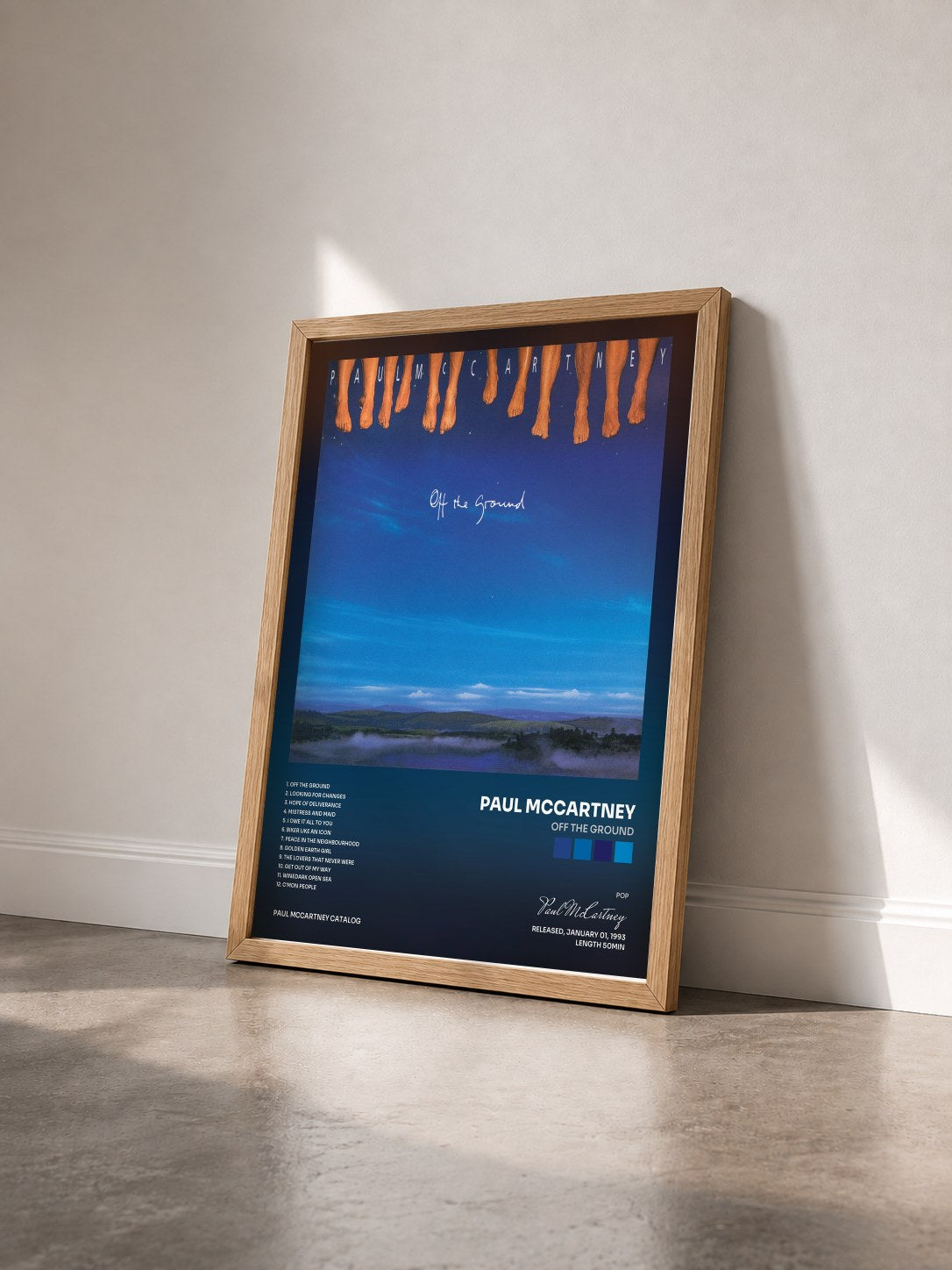 #bois Tableau de l'album Off The Ground de Paul McCartney vu de trois quarts, cadre en bois brut