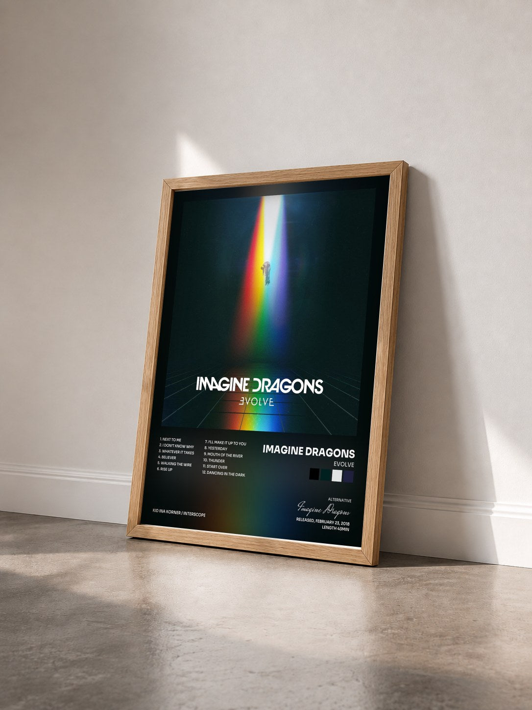 #bois Tableau de l'album Evolve de Imagine Dragons vu de trois quarts, cadre en bois brut