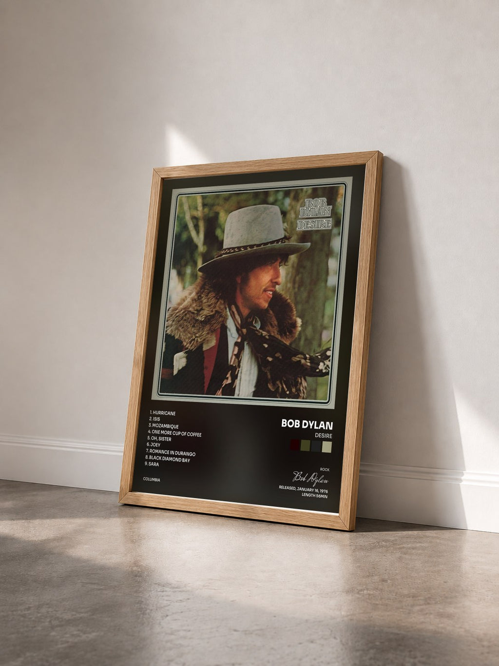 #bois Tableau de l'album Desire de Bob Dylan vu de trois quarts, cadre en bois brut
