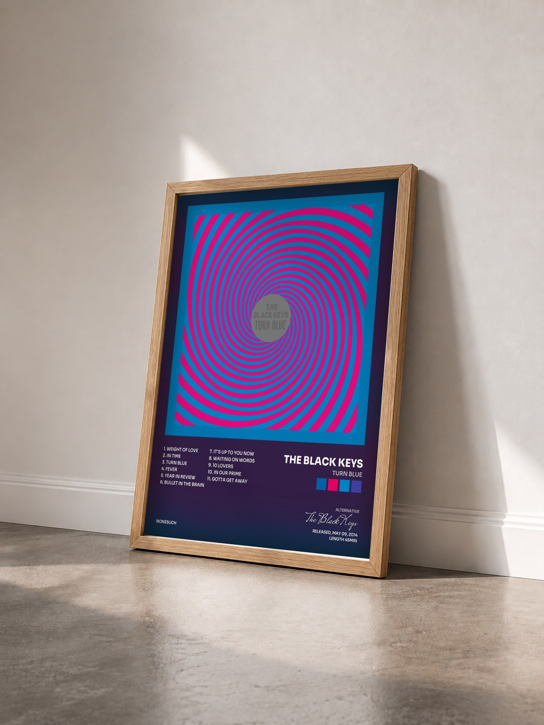 #bois Tableau de l'album Turn Blue de The Black Keys vu de trois quarts, cadre en bois brut