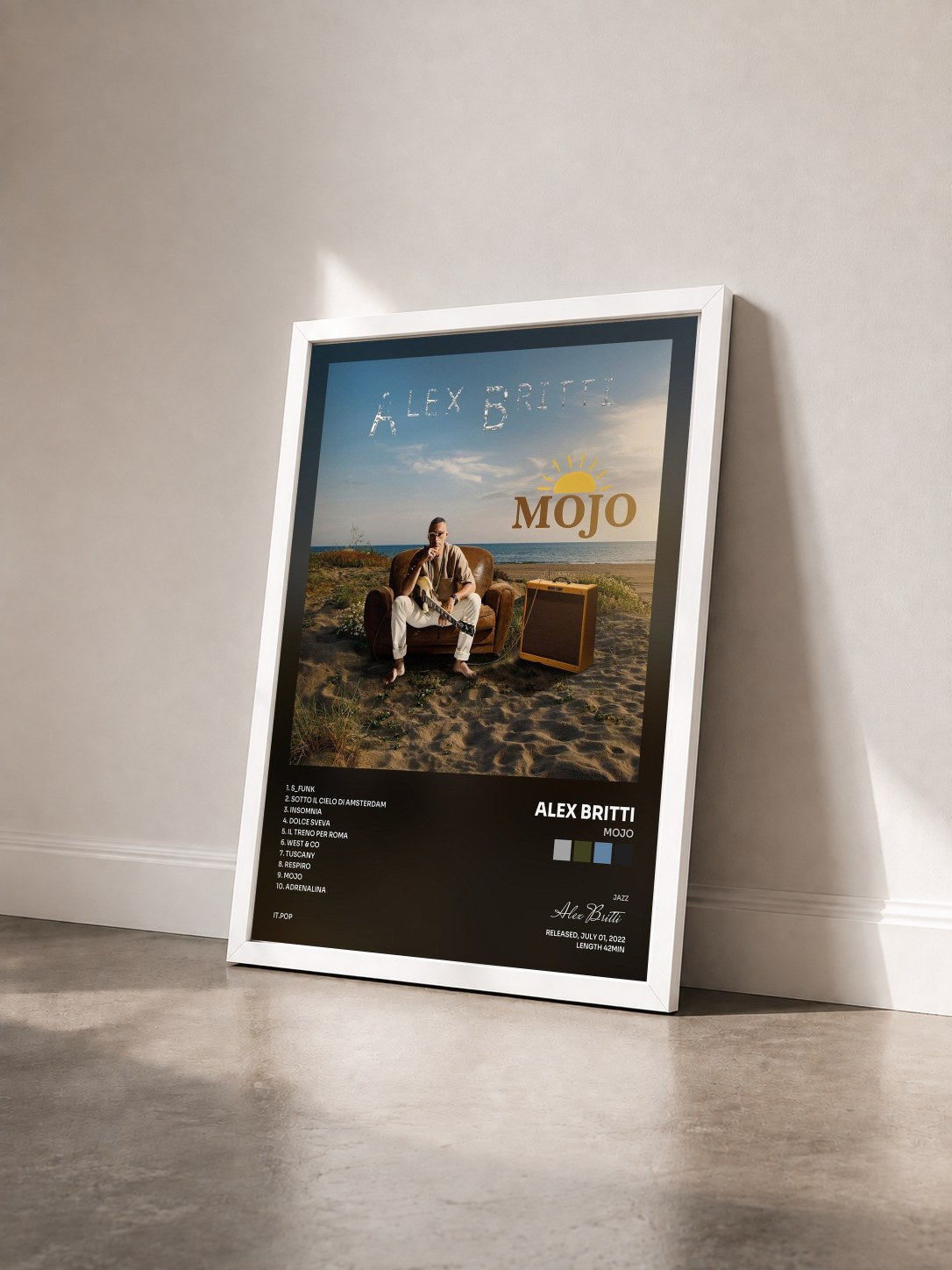 #blanc Tableau de l'album Mojo de Alex Britti vu de trois quarts, cadre blanc