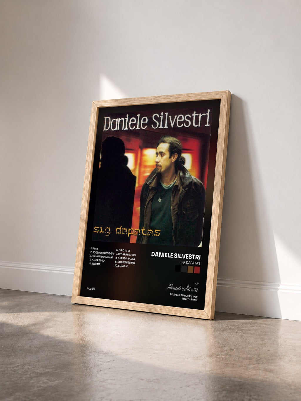 #bois Tableau de l'album Sig. Dapatas de Daniele Silvestri vu de trois quarts, cadre en bois brut