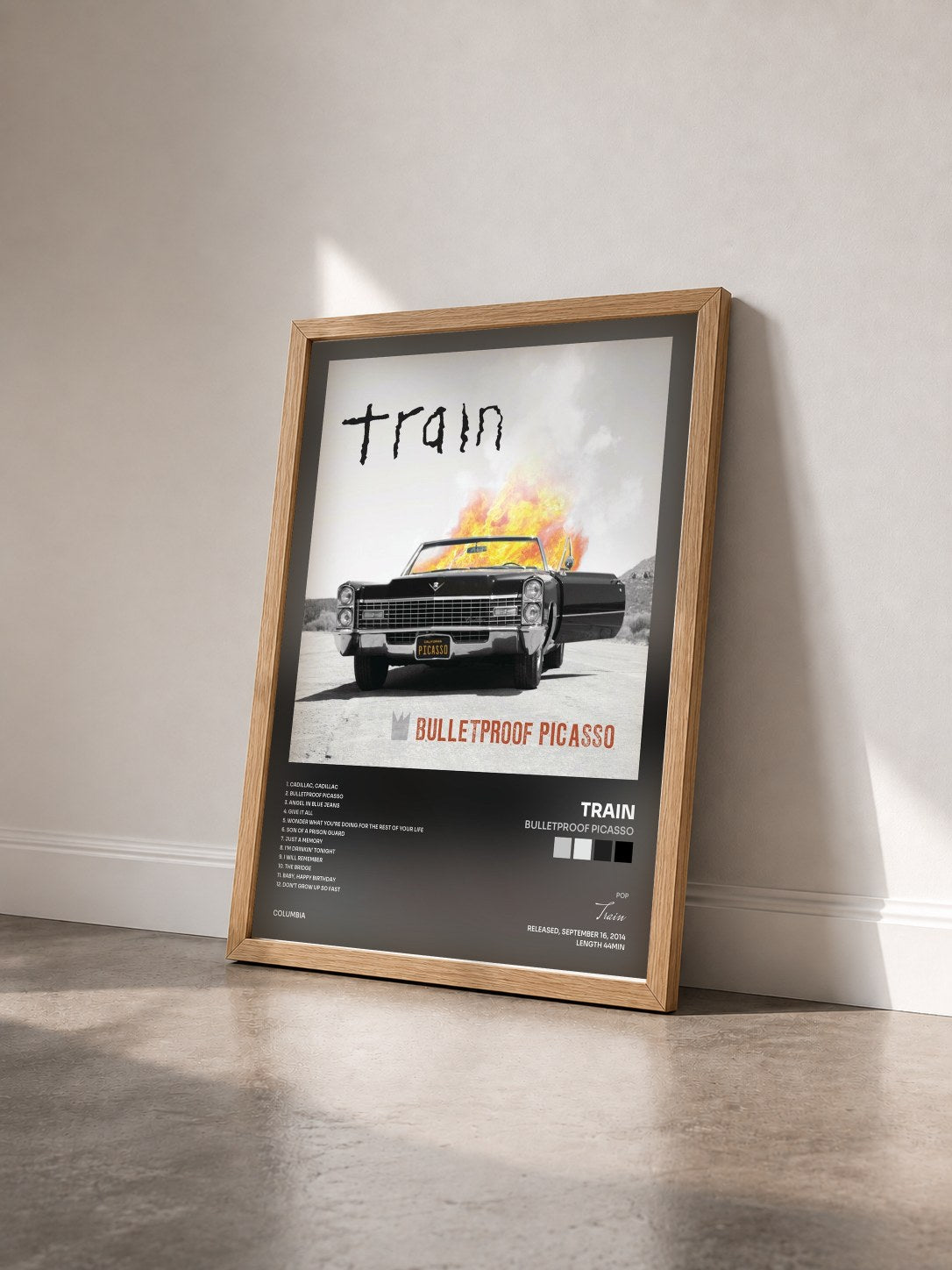 #bois Tableau de l'album Bulletproof Picasso de Train vu de trois quarts, cadre en bois brut