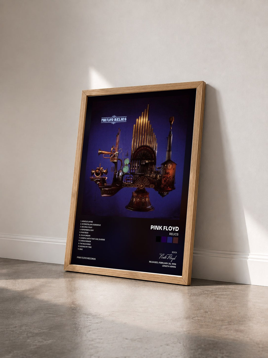 #bois Tableau de l'album Relics de Pink Floyd vu de trois quarts, cadre en bois brut