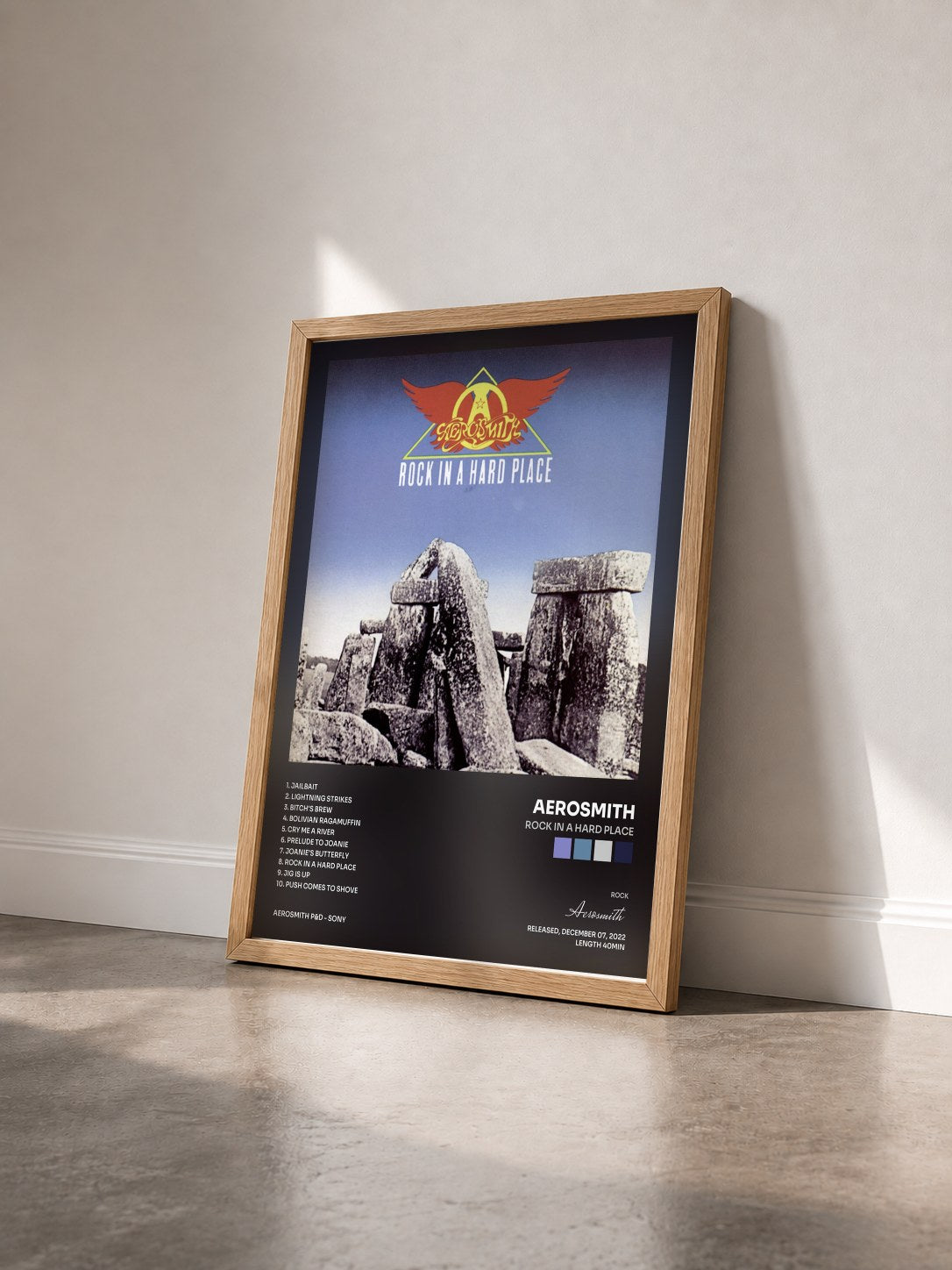 #bois Tableau de l'album Rock In A Hard Place de Aerosmith vu de trois quarts, cadre en bois brut
