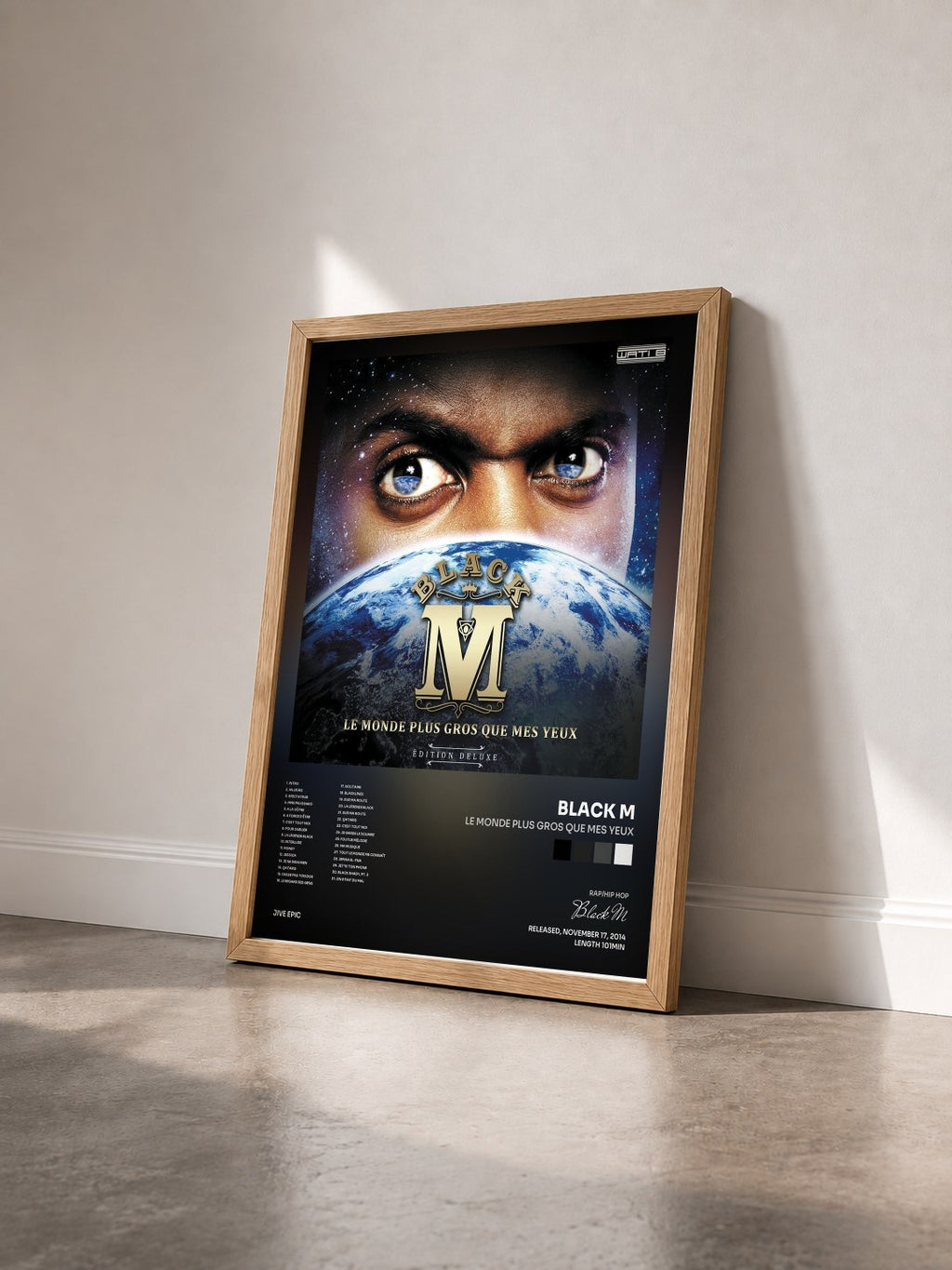 #bois Tableau de l'album Le monde plus gros que mes yeux de Black M vu de trois quarts, cadre en bois brut
