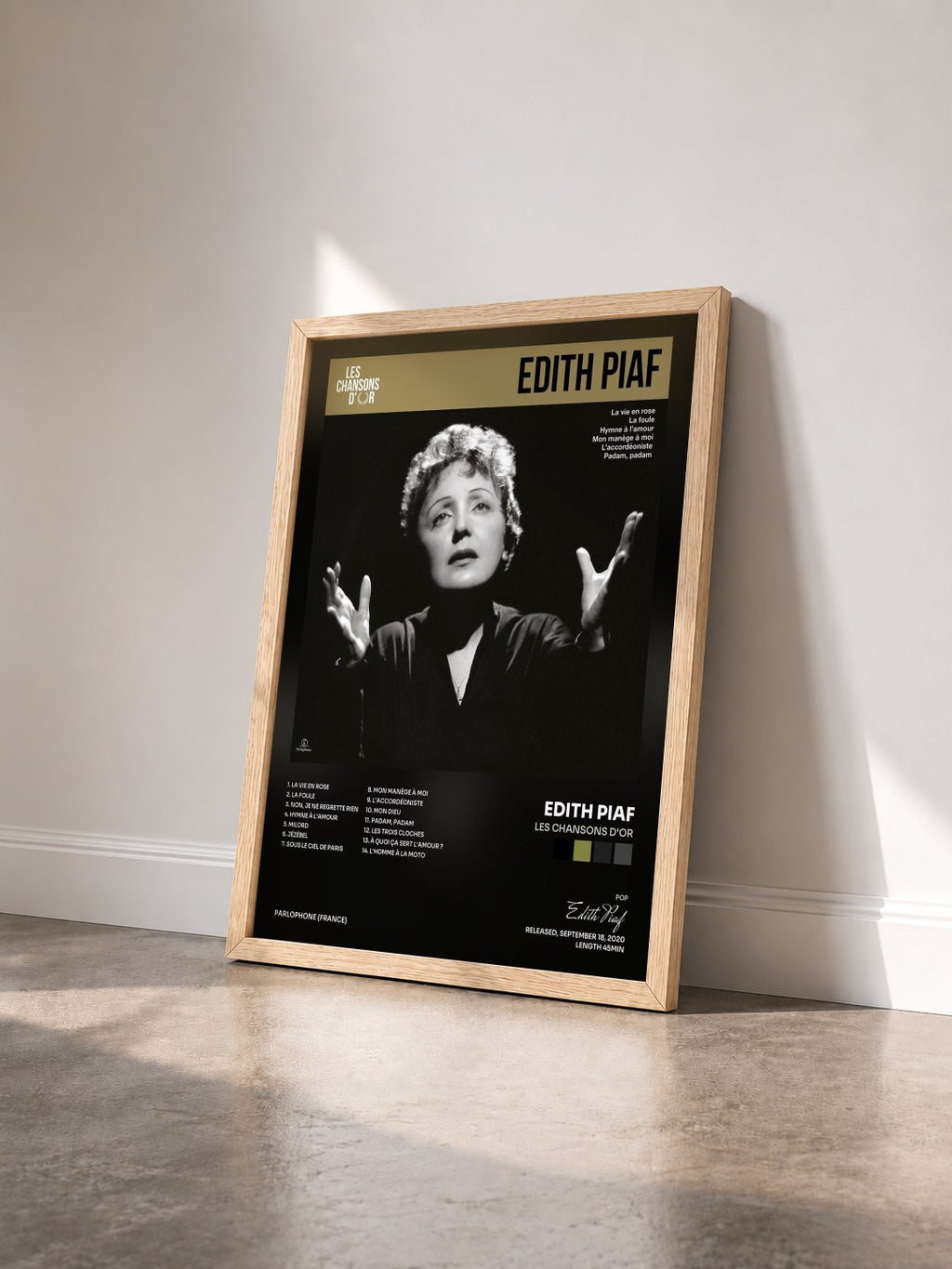 #bois Tableau de l'album Les chansons d'or de Edith Piaf vu de trois quarts, cadre en bois brut
