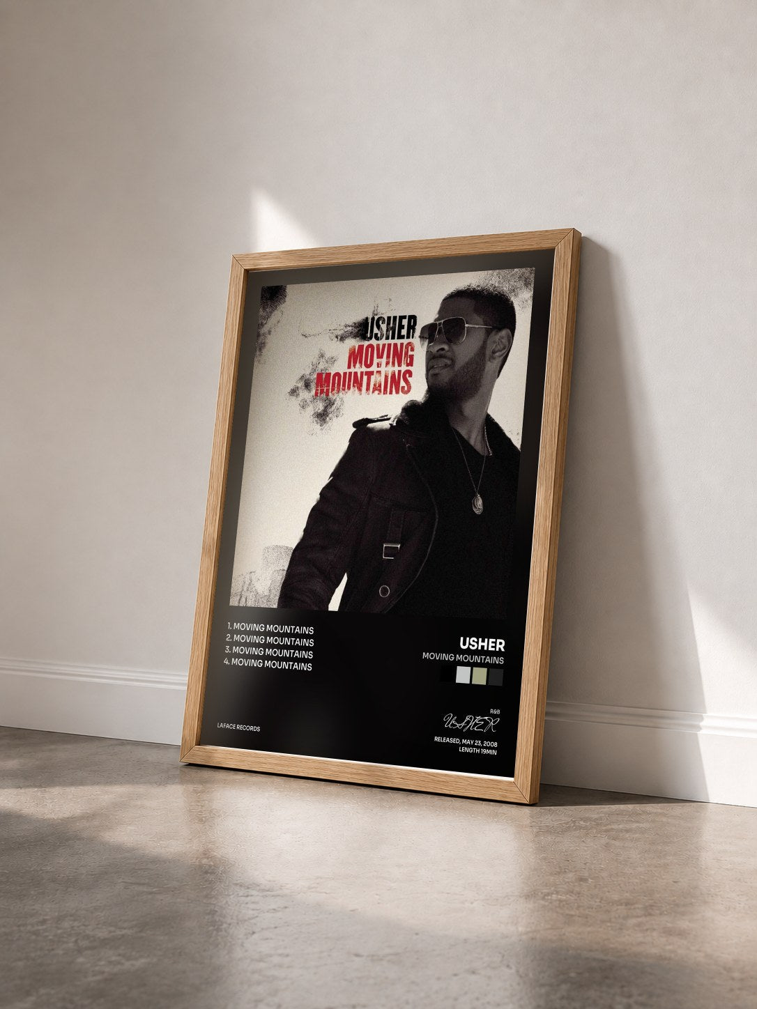 #bois Tableau de l'album Moving Mountains de USHER vu de trois quarts, cadre en bois brut