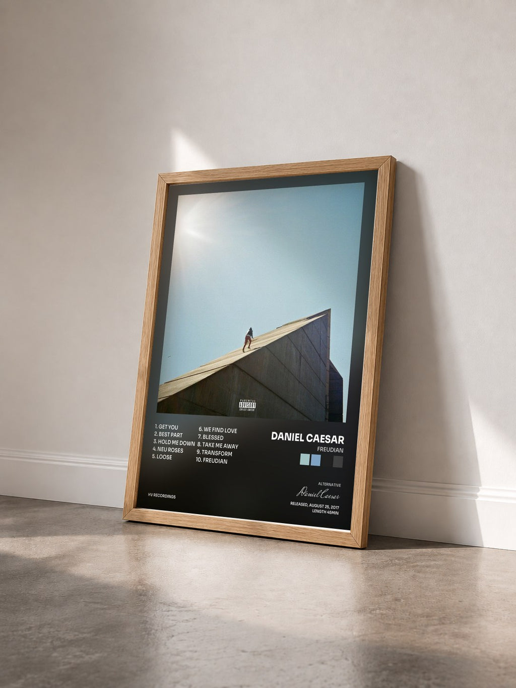 #bois Tableau de l'album Freudian de Daniel Caesar vu de trois quarts, cadre en bois brut