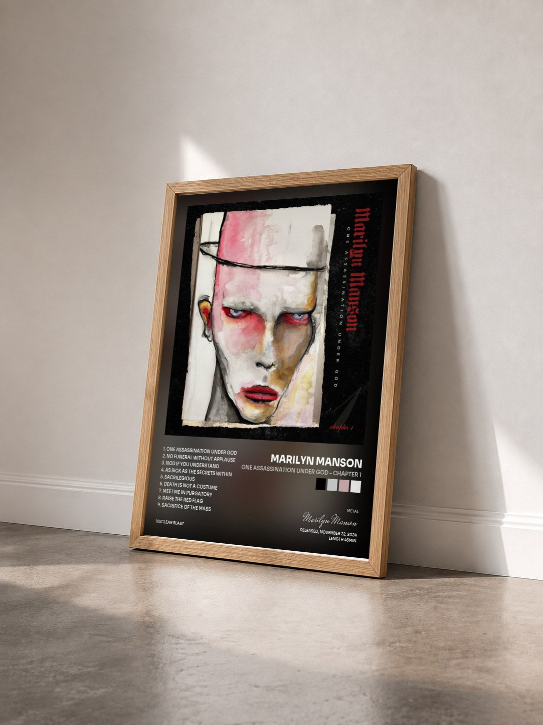#bois Tableau de l'album One Assassination Under God - Chapter 1 de Marilyn Manson vu de trois quarts, cadre en bois brut
