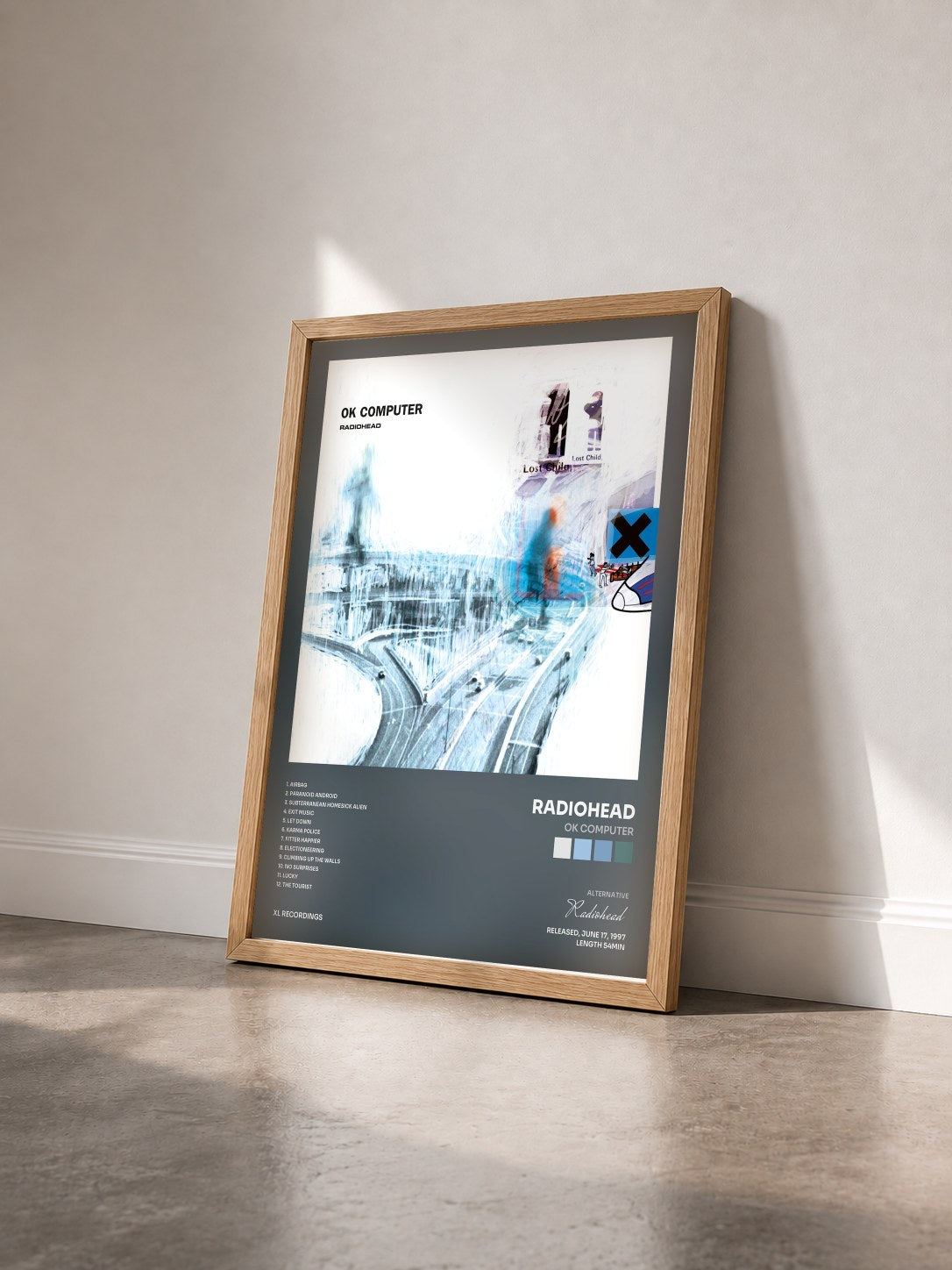 #bois Tableau de l'album OK Computer de Radiohead vu de trois quarts, cadre en bois brut