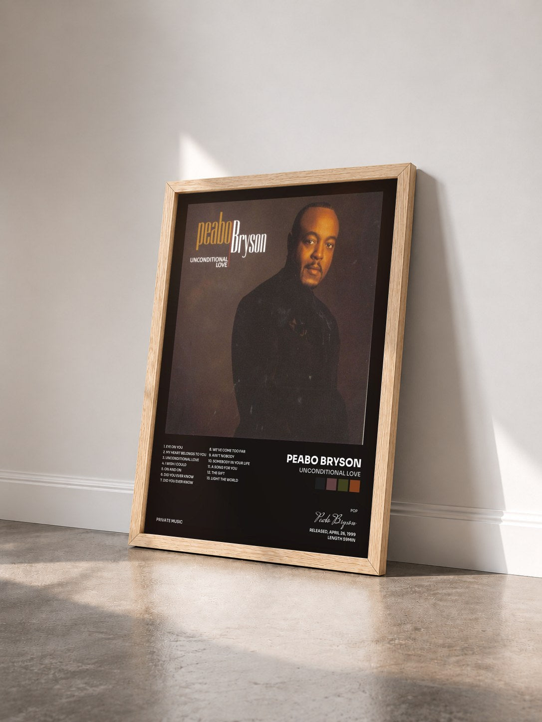#bois Tableau de l'album Unconditional Love de Peabo Bryson vu de trois quarts, cadre en bois brut