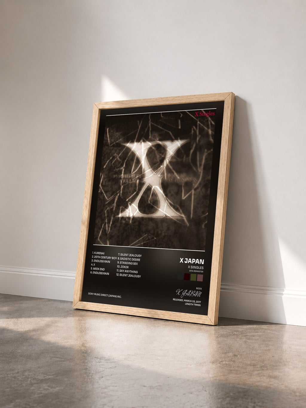 #bois Tableau de l'album X Singles (2014 Remaster) de X JAPAN vu de trois quarts, cadre en bois brut