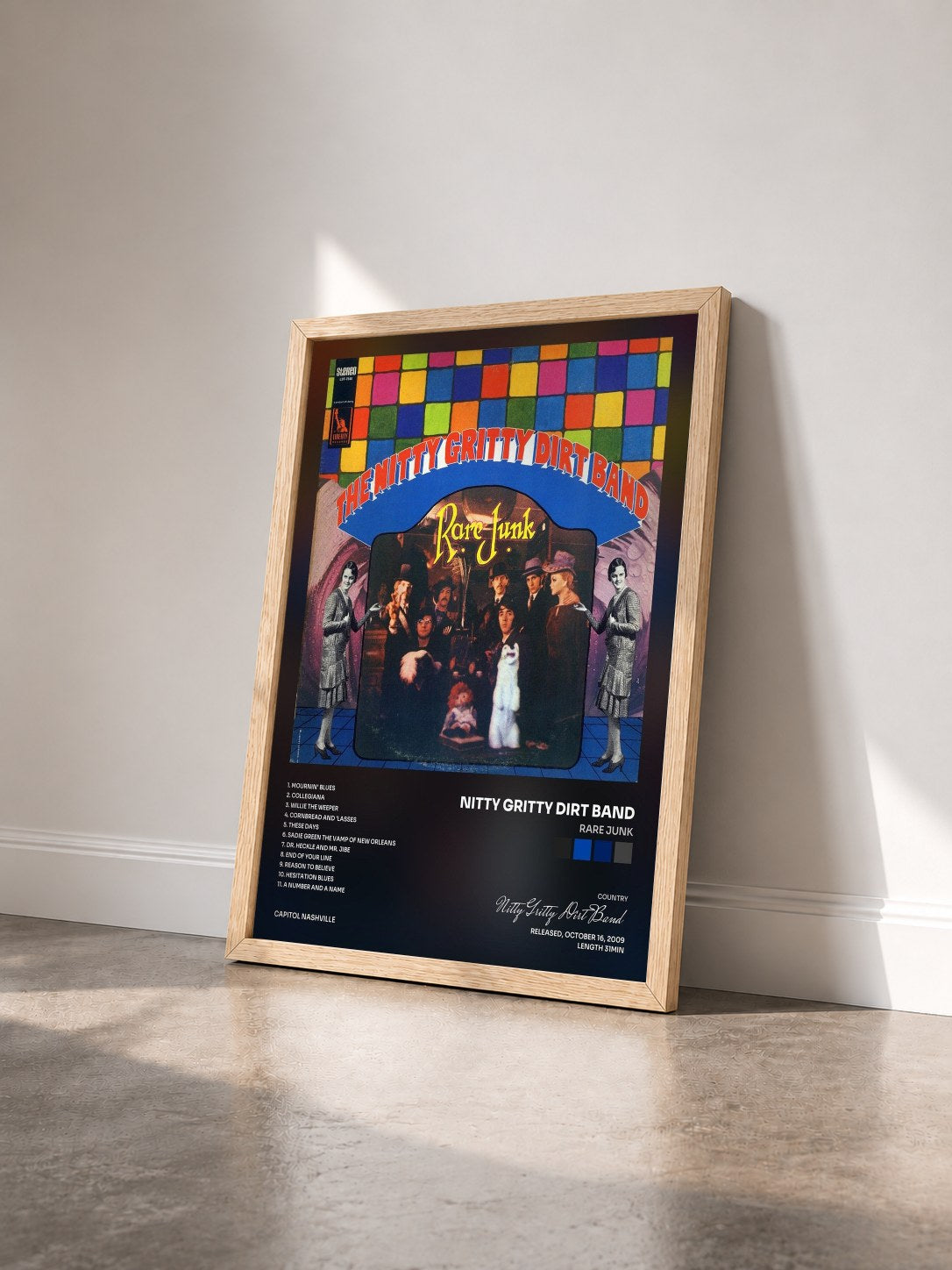#bois Tableau de l'album Rare Junk de Nitty Gritty Dirt Band vu de trois quarts, cadre en bois brut
