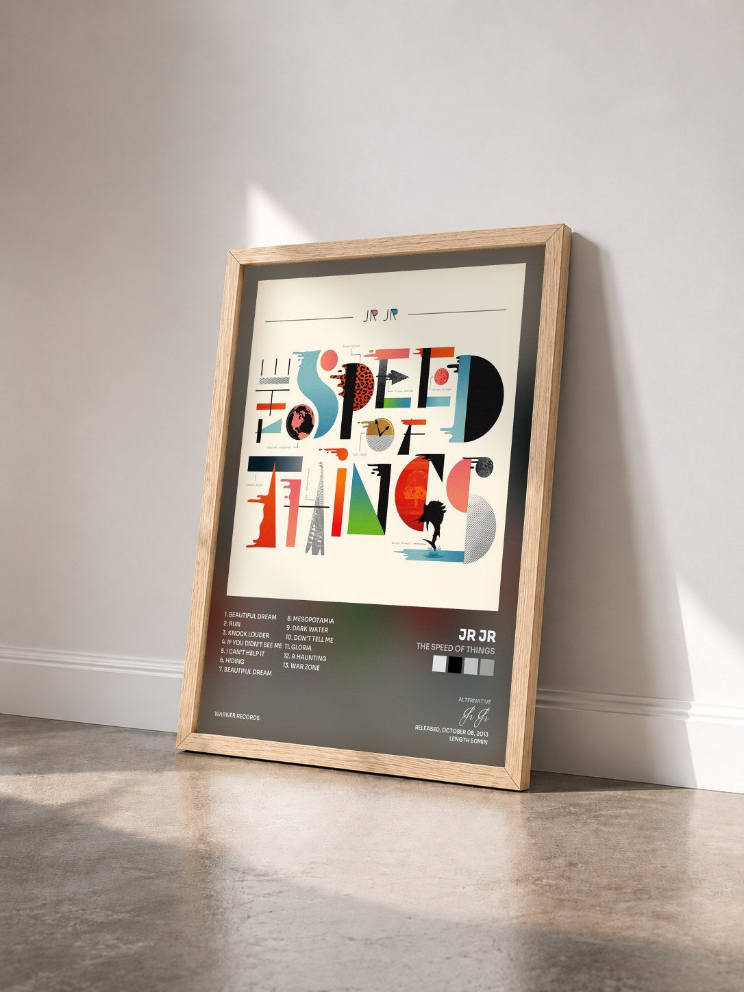 #bois Tableau de l'album The Speed of Things de Jr Jr vu de trois quarts, cadre en bois brut