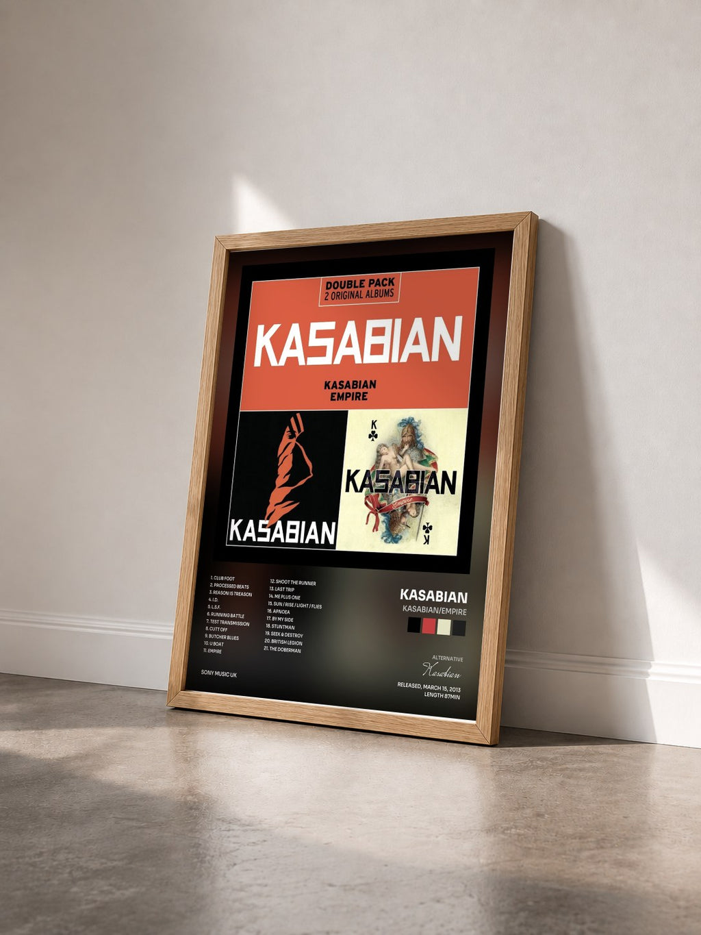 #bois Tableau de l'album Kasabian/Empire de Kasabian vu de trois quarts, cadre en bois brut