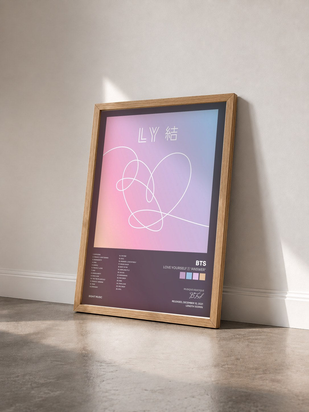 #bois Tableau de l'album Love Yourself 結 'Answer' de BTS vu de trois quarts, cadre en bois brut