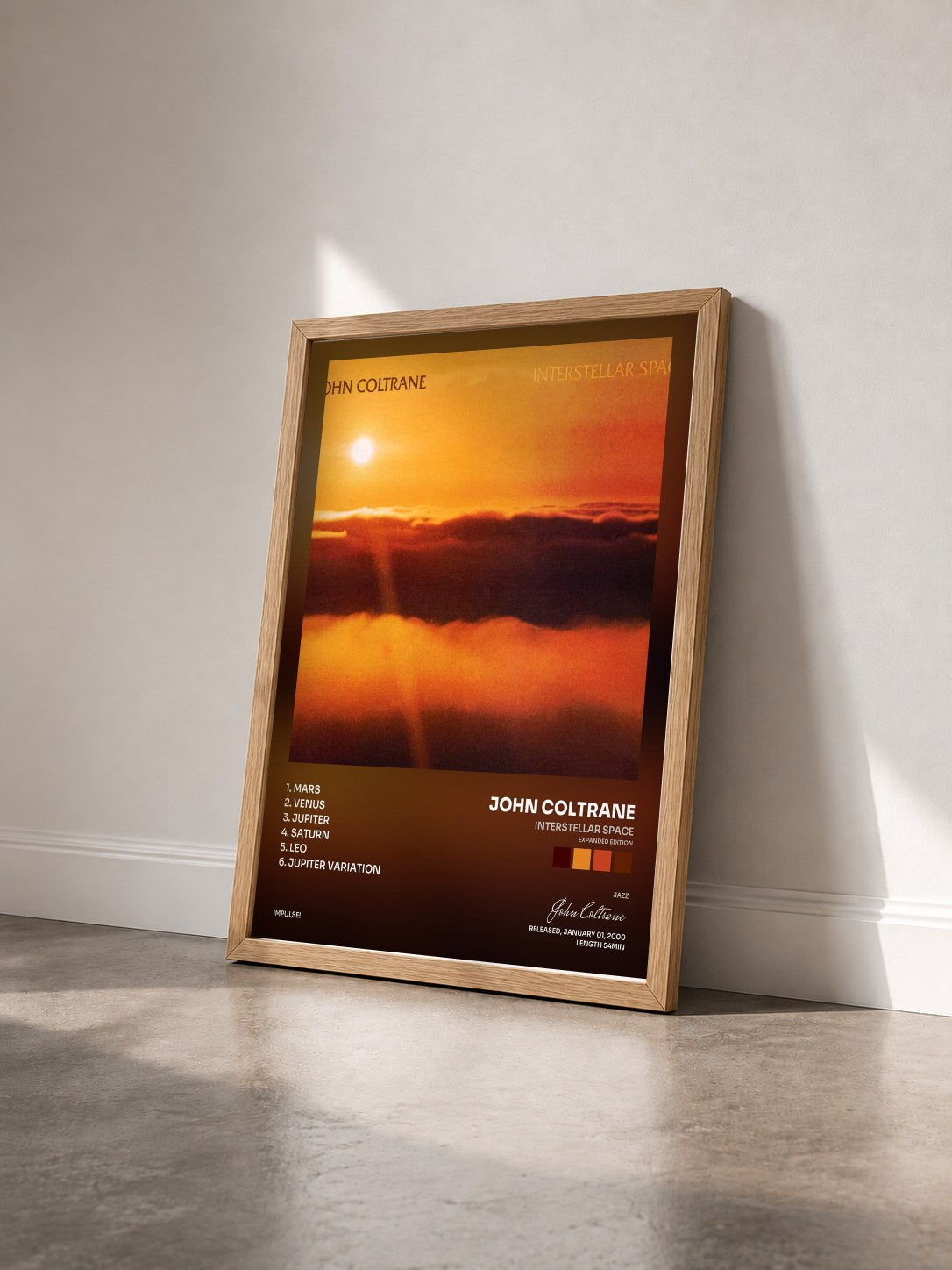 #bois Tableau de l'album Interstellar Space (Expanded Edition) de John Coltrane vu de trois quarts, cadre en bois brut
