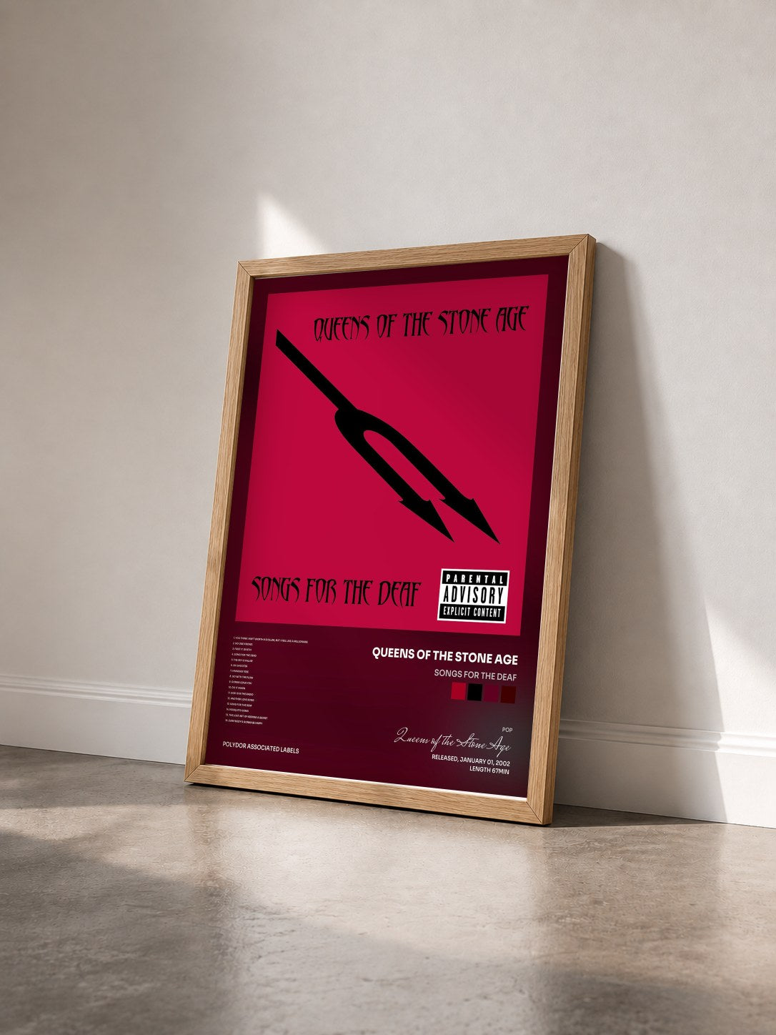 #bois Tableau de l'album Songs For The Deaf de Queens of the Stone Age vu de trois quarts, cadre en bois brut