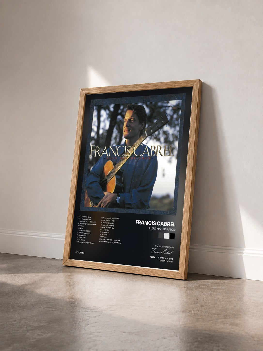 #bois Tableau de l'album Algo Más de Amor de Francis Cabrel vu de trois quarts, cadre en bois brut