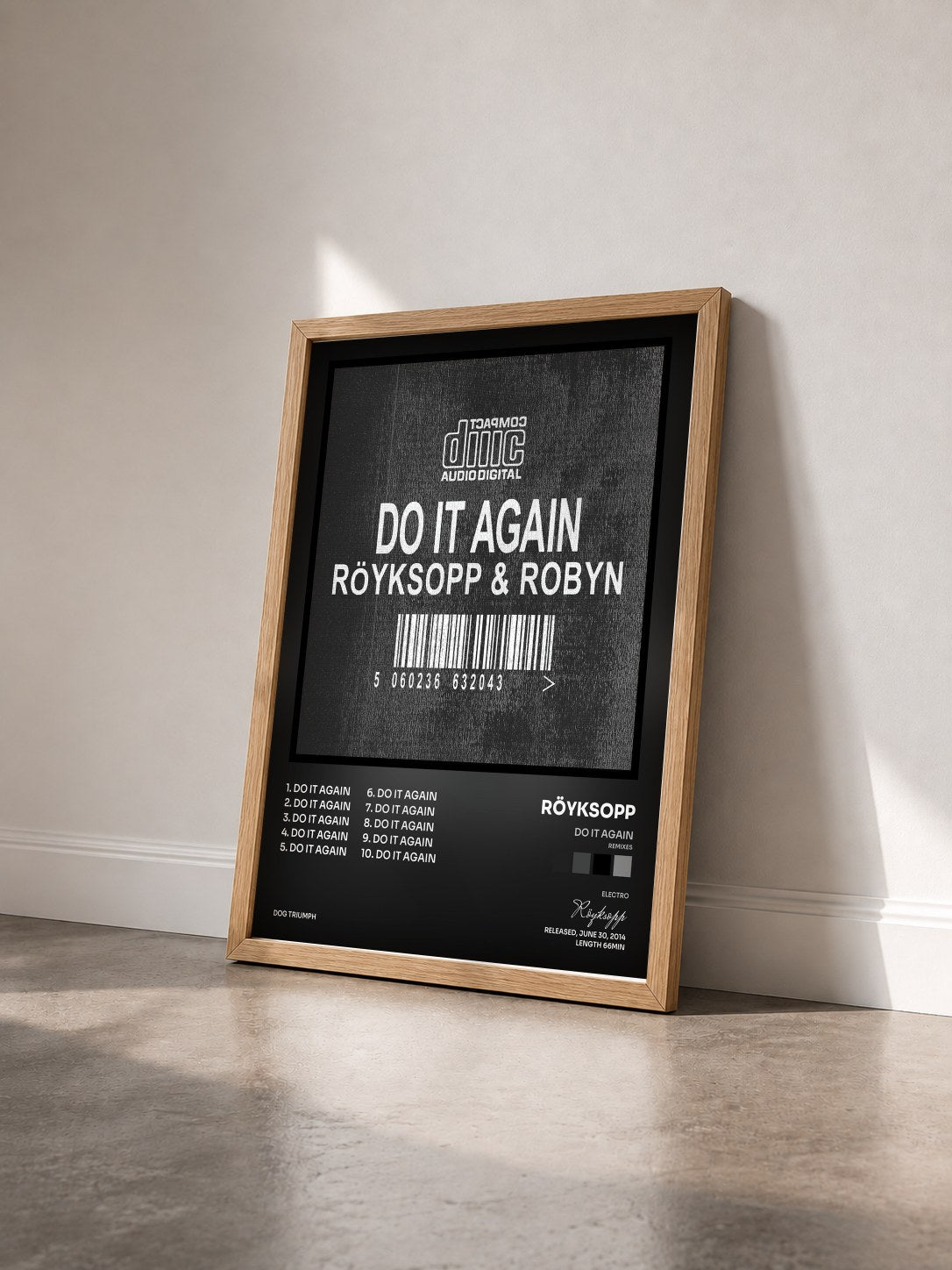 #bois Tableau de l'album Do It Again (Remixes) de Röyksopp vu de trois quarts, cadre en bois brut