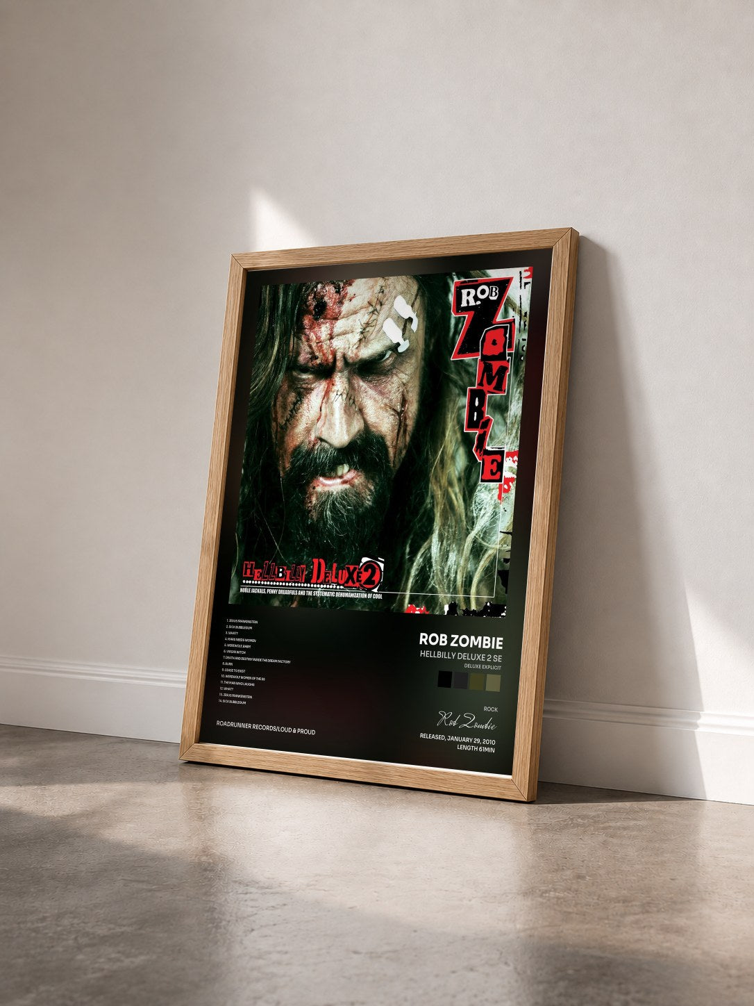 #bois Tableau de l'album Hellbilly Deluxe 2 SE (Deluxe Explicit) de Rob Zombie vu de trois quarts, cadre en bois brut