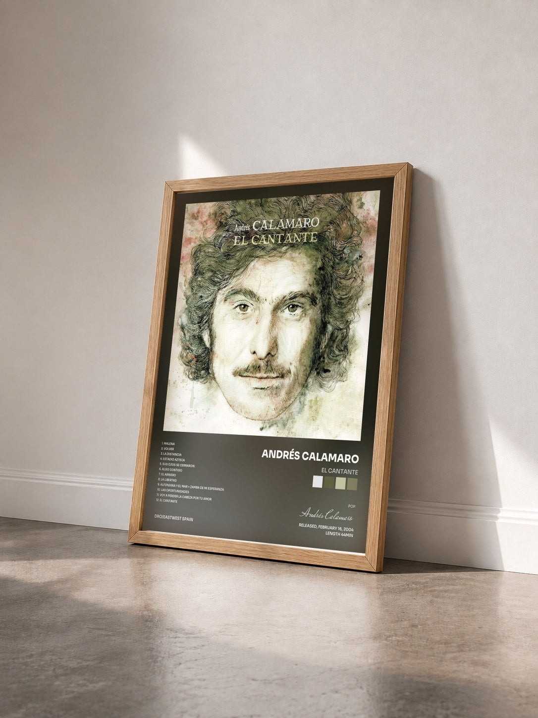 #bois Tableau de l'album El cantante de Andrés Calamaro vu de trois quarts, cadre en bois brut